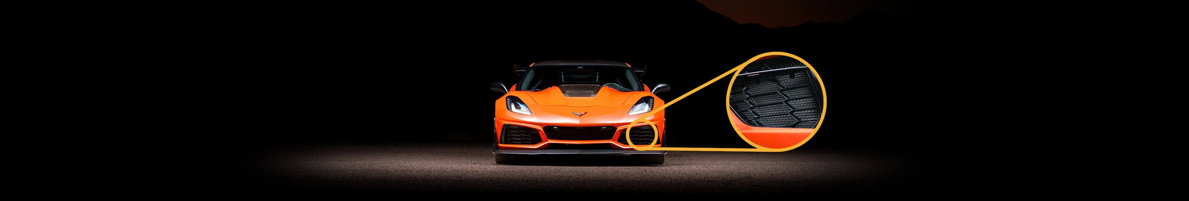 Corvette front view with close-up callout of the radiator and intake guard mesh